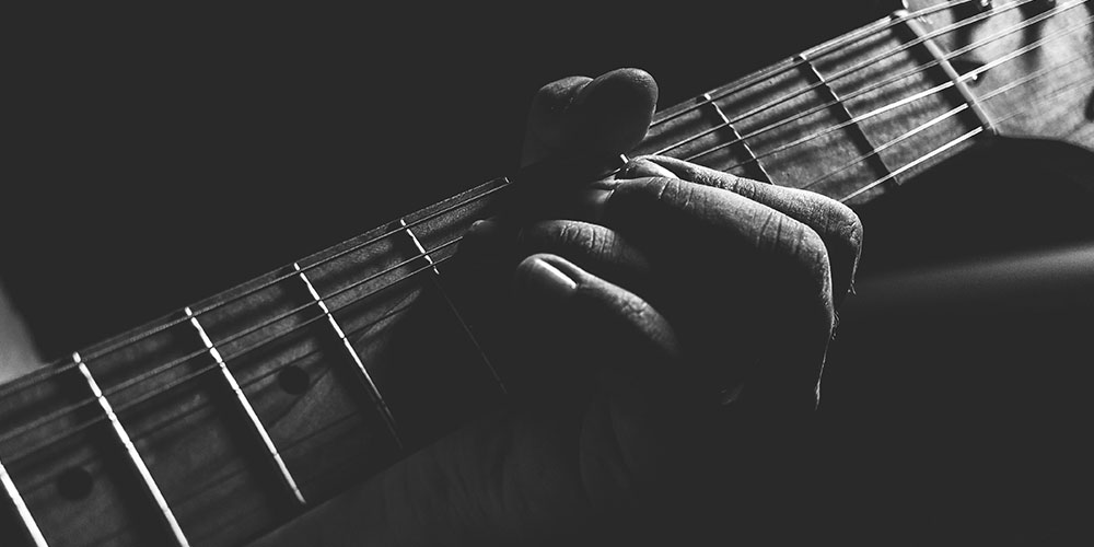 Learn to Play 10 Guitar Songs Using Just 3 Chords