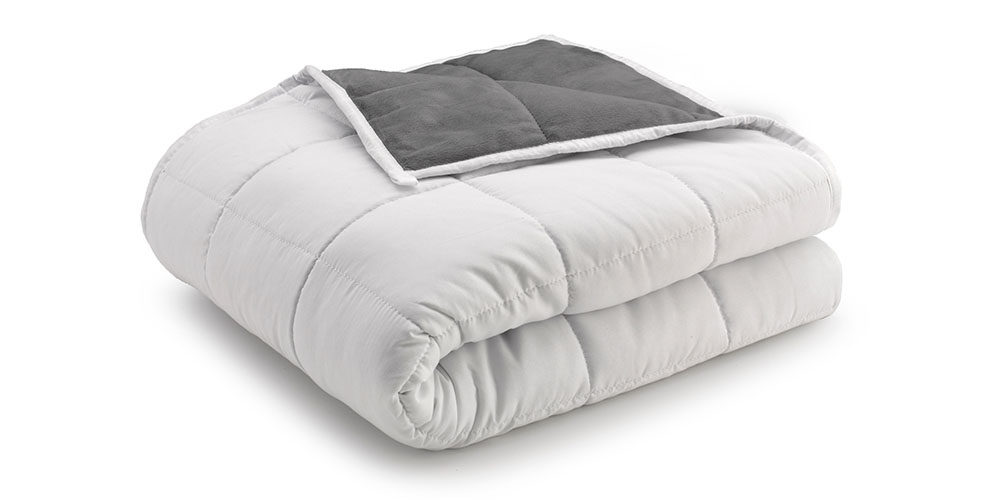 A white and gray folded weighted blanket