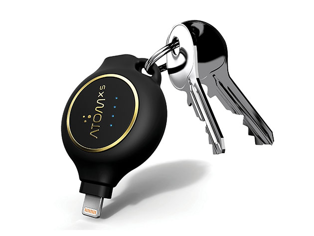A set of keys with a keychain charger